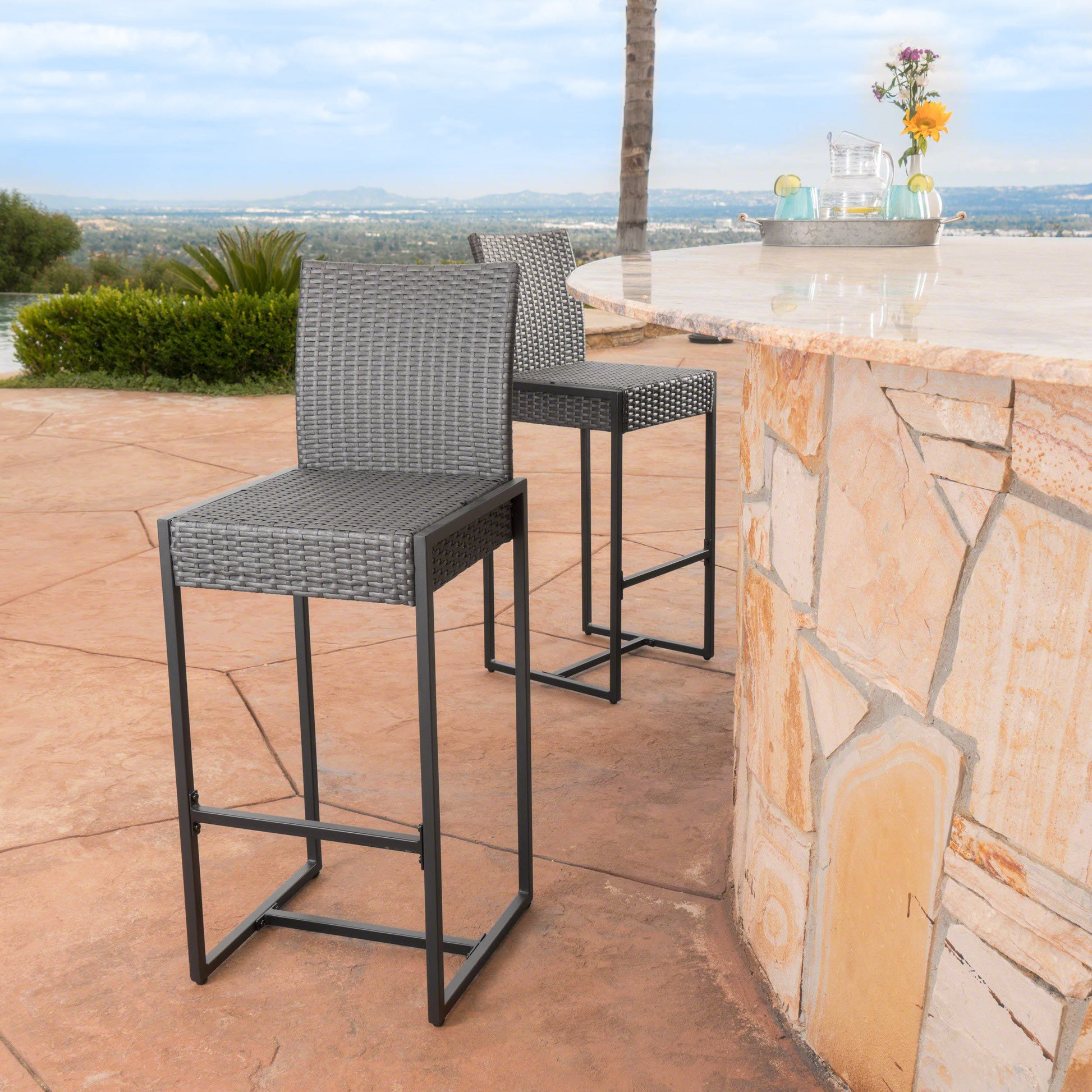 Stylish Vimora™ - Grey Polyethylene Rattan Outdoor Wicker Barstool Set of 2, perfect for your patio or backyard space.